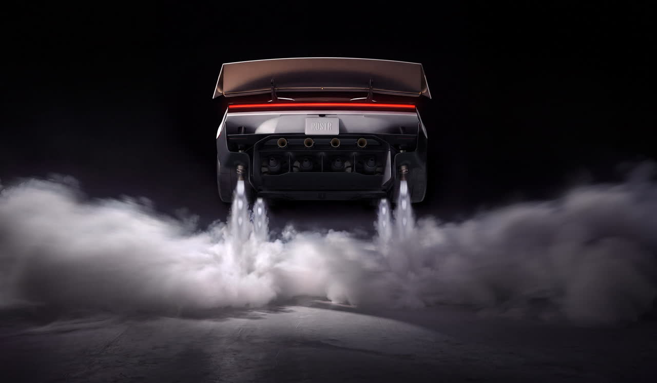 Rear of the Roadster in the dark, four thrusters firing down into a cloud of vapor